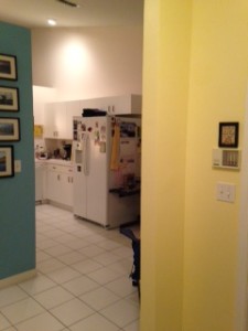 As you look into the kitchen.